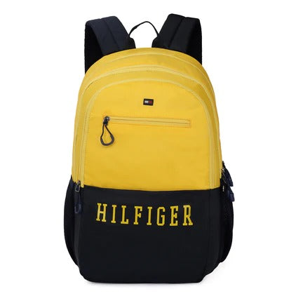 Introducing the Tommy Hilfiger Bridger Non-laptop Backpack, a stylish and functional addition to your collection. With its eye-catching orange and navy color scheme, this backpack is sure to turn heads. It is part of the unisex Friends line, making it a versatile choice for everyone. It is made of high-quality polyester fabric and is designed to last. 